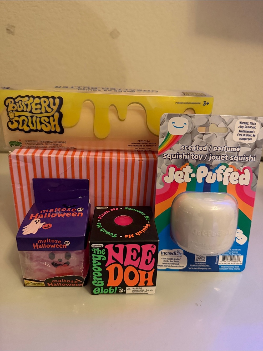 NeeDoh Groovy Glob Pink, Buttery Squish, Jet-Puff scent, Glitter Halloween Cube
